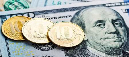Доллар/рубль колеблется между 70.80 и 71.50